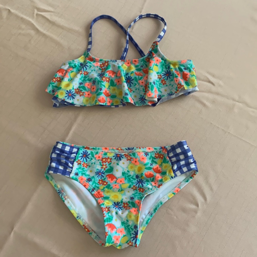 2 piece cute swimming suit has been worn before but in good condition